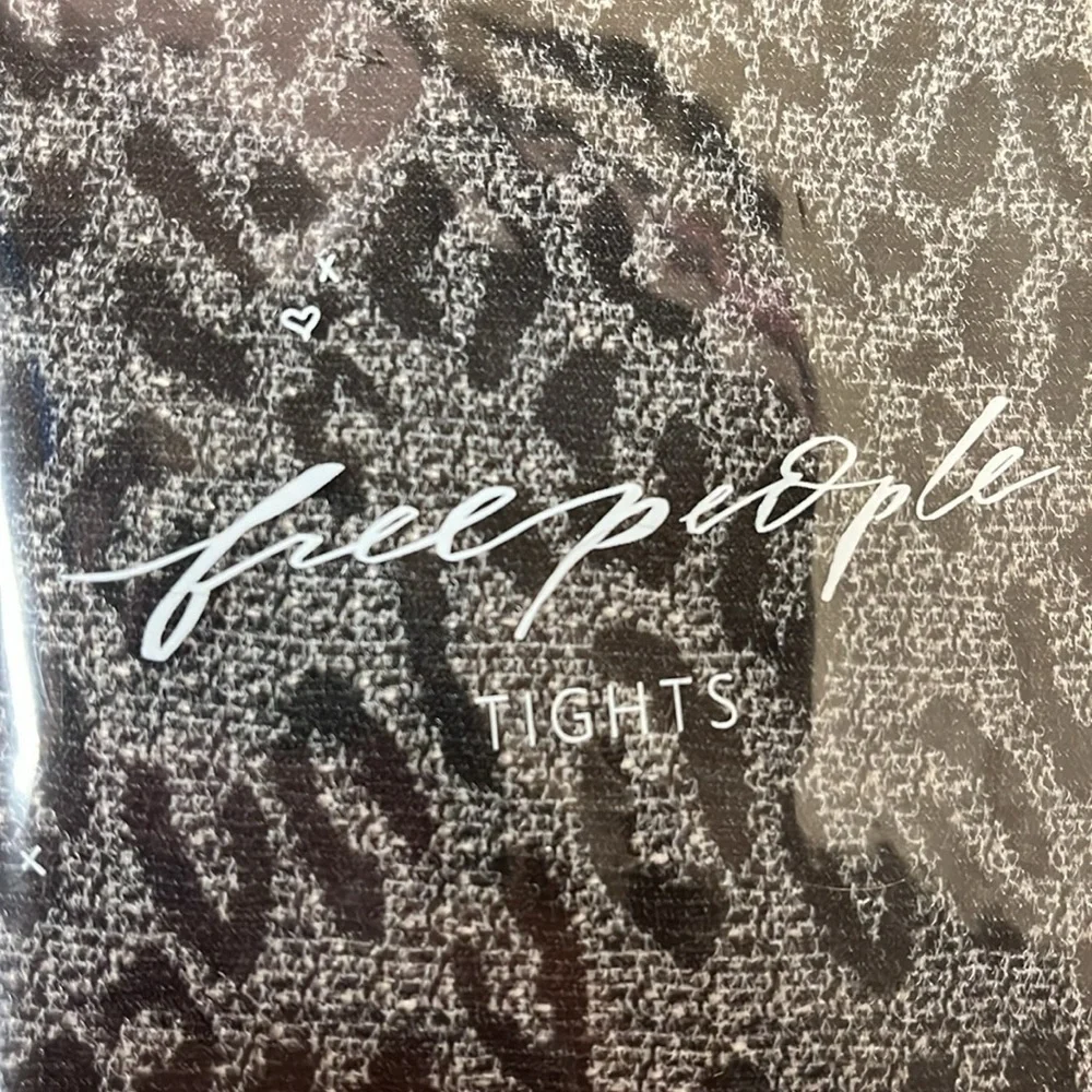 Free people animal instinct tights snow leopard